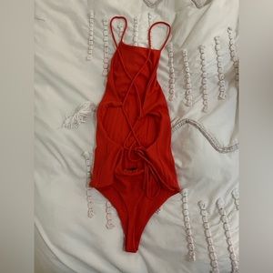 Privacy please red strappy open back bodysuit
